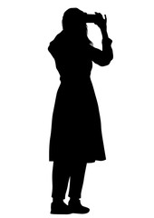 Young woman with phone on a white background