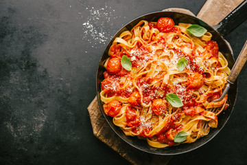 Tomato sauce spaghetti pasta on pan