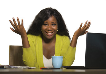 young happy and attractive black Afro American business woman smiling cheerful and confident working at office computer desk relaxed as successful businesswoman