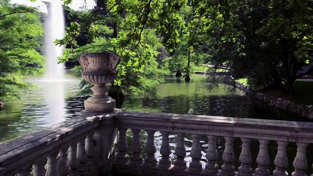 Tranquil corner with a small lake in El Retiro Park in Madrid