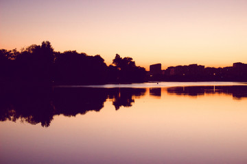 Fototapeta na wymiar sunset over river