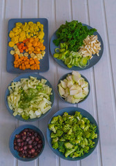 small cut various vegetables on a white board
