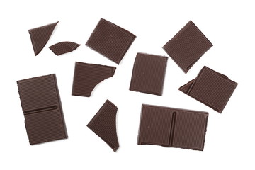 Dark chocolate with cocoa bars, pieces isolated on white background, top view
