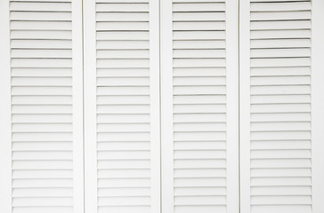 Plantation style white window sun shutters. Background concept.