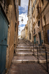 Fototapeta na wymiar Marseille, South of France, Stairs to vieux quartiers Le Panier