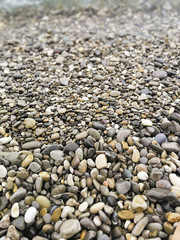 Pebble sand beach of Buse in the Gulf Blue Cabbé at Cap Martin at early morning