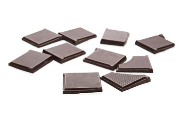 Dark chocolate with cocoa bars, pieces isolated on white background