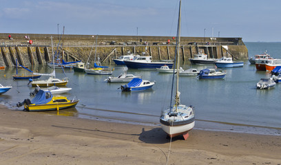 fishing boats, sail boat and low tide