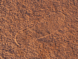 Tennis court with foot marks in antuka wait for service.