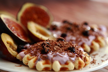 breakfast with waffles plums figs berries