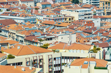 Fototapeta na wymiar Buildings piled on top of each other in the Principality of Monaco during a summer day