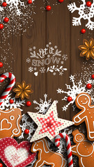 Mobile phone Christmas wallpaper, gingerbread and ornaments on wood