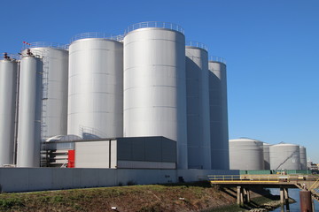 Tanks and pipes in the chemical industries in the Botlek Harbor in Rotterdam.