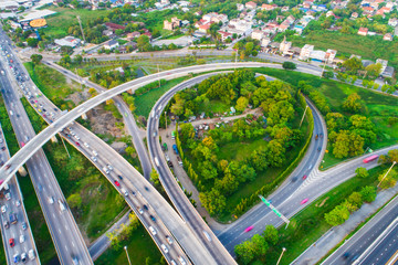 Aerial view of city transport junction road with vehicle