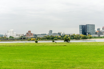 panorama of city with blue sky and clouds on the river
