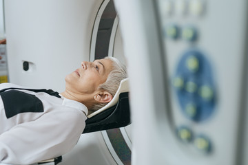 Patient Lying on the CT Scanner Bed