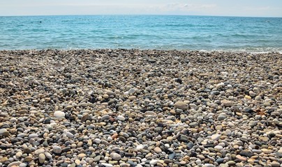 View of the calm Black sea, blue sky beach and horizon.