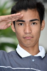 Obraz premium Asian Male Saluting