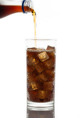 Cola in glass with ice isolated on white background