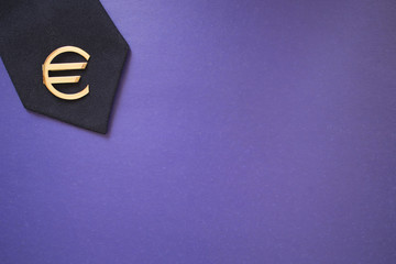 tie and cufflinks in the form of Euro sign on a blue background, copy space, place for advertising...