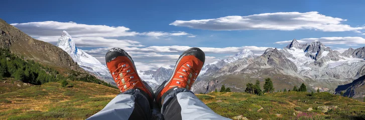 Photo sur Plexiglas Cervin Swiss Alps with hiking boots in Zermatt area, Switzerland