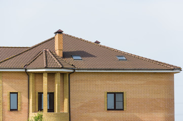 house with a gable roof window
