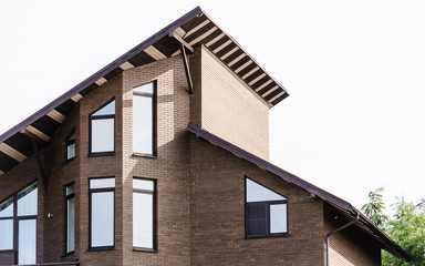 house with a gable roof window