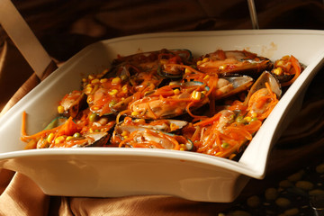 Mussels with white wine sauce is a traditional French dish, mussels mariniere or moules mariniere. Mussels steamed in white wine served in sauce of juices from the mussels, wine, butter, and shallots.