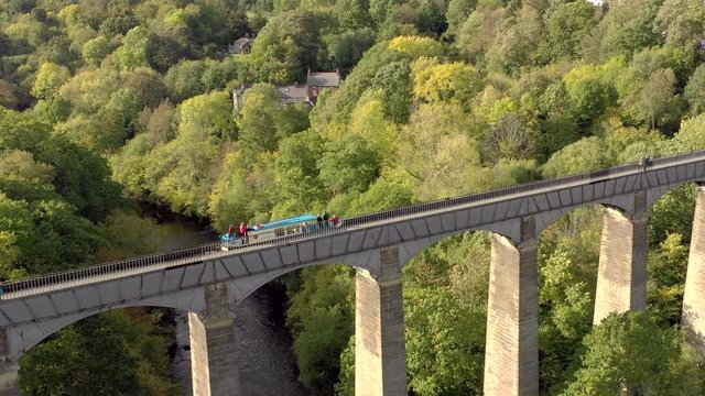 Narrowboat Traversing Pontcysyllte Aqueduct in North Wales
