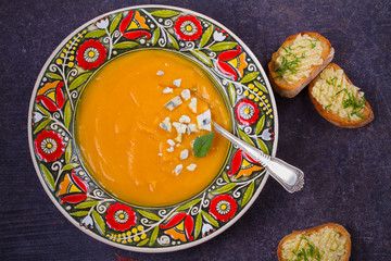 Roasted Pumpkin Soup with Blue Cheese and Garlic Butter Toasts. Butternut Squash Soup. vegetarian dish. overhead, horizontal