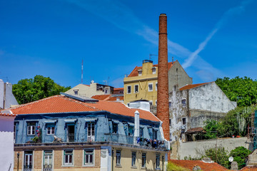Fototapeta na wymiar Old buildings and chimney in Lisbon, Portugal