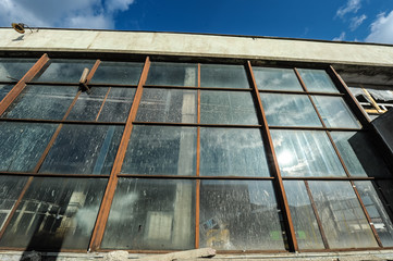 Old warehouse with rusty construction elements.