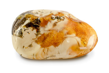 Polished amber stone isolated on white background
