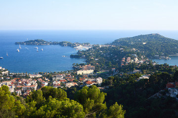 Fototapeta na wymiar Cote d'Azur France. View of luxury resort and bay of French riviera - between Nice city and Monaco. Mediterranean Sea 1.10.18.