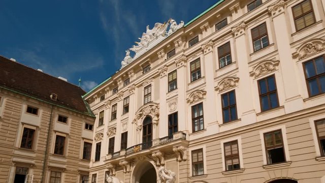 Establishing shot of the Imperial Chancellery Wing at Hofburg Palace in Vienna, Austria, former residence of the Habsburg dynasty
