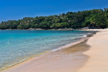 Fototapeta na wymiar Tropical beach with azure water
