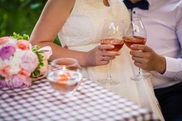 a glass of wine on a table in a cafe