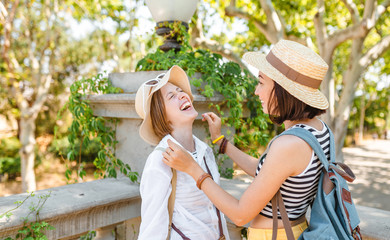 happy girls on summer vacation in historical site