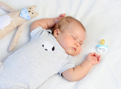 Portrait of a sleeping 3 month old baby