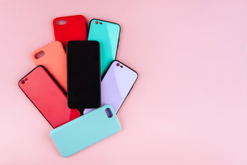 Set of colored plastic covers for smartphone isolated on a white background - Powered by Adobe