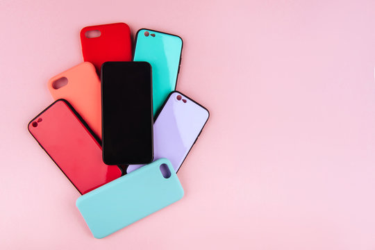 Set of colored plastic covers for smartphone isolated on a white background
