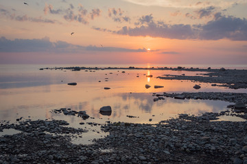 The sun goes down to the sea