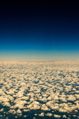 Fototapeta premium Aerial shot above the clouds