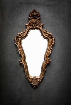 antique mirror on a black background