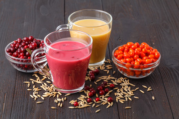 close up of fresh fruits smoothie with raw berry