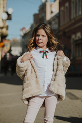 Walk around the city. A warm day. A cute child.