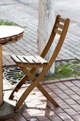 wooden chairs close-up in a street cafe