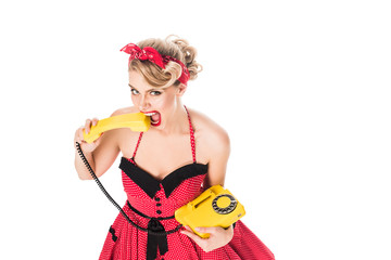 high angle view of woman in pin up dress with retro telephone isolated on white