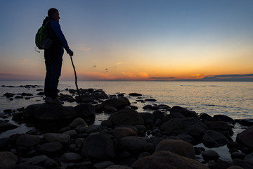 A hiker by the sea