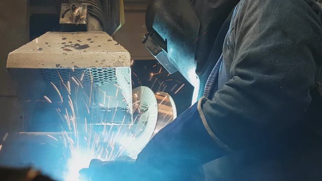 Co2 Welding By Skill Welder In Factory Industrial